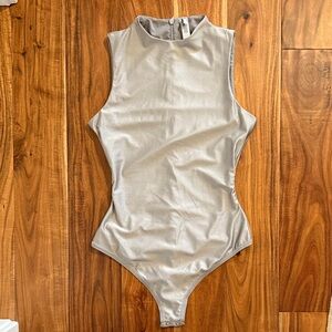 SKIMS Silver Mock Neck Disco Bodysuit, size Medium